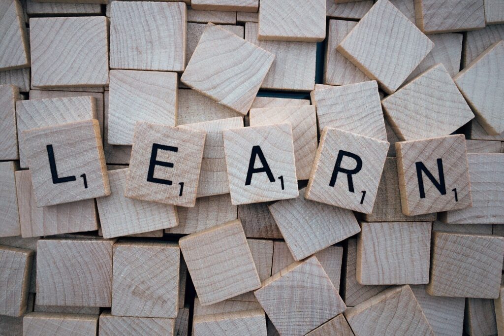 Scrabble letters spelling out LEARN