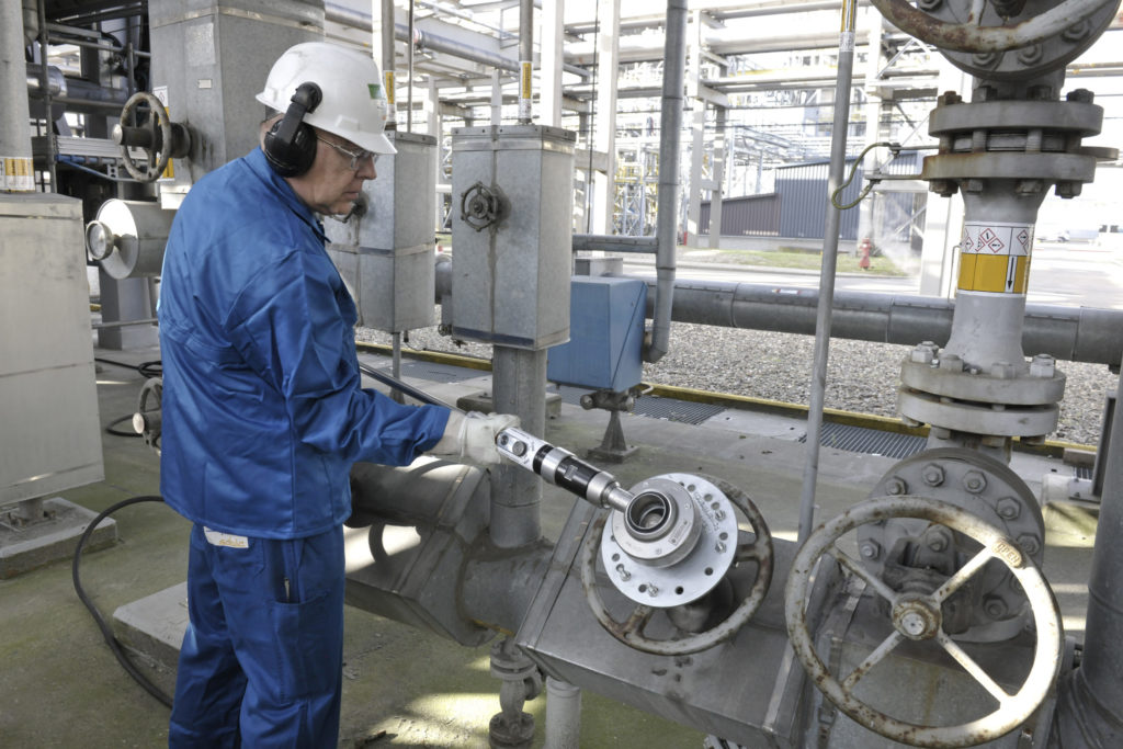 Man using a power wrench